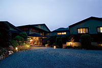 Hotel facade at night.