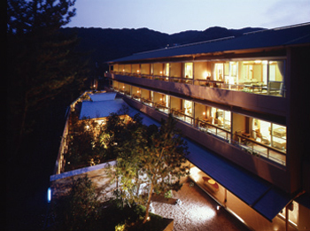Hotel facade at night.