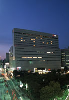Hotel facade at night.